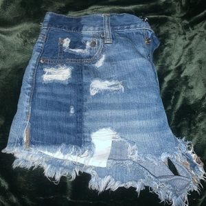 Distressed denim shorts